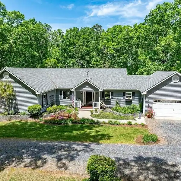 CUSTOM ONE-LEVEL HOME ON FIVE PRISTINE ACRES