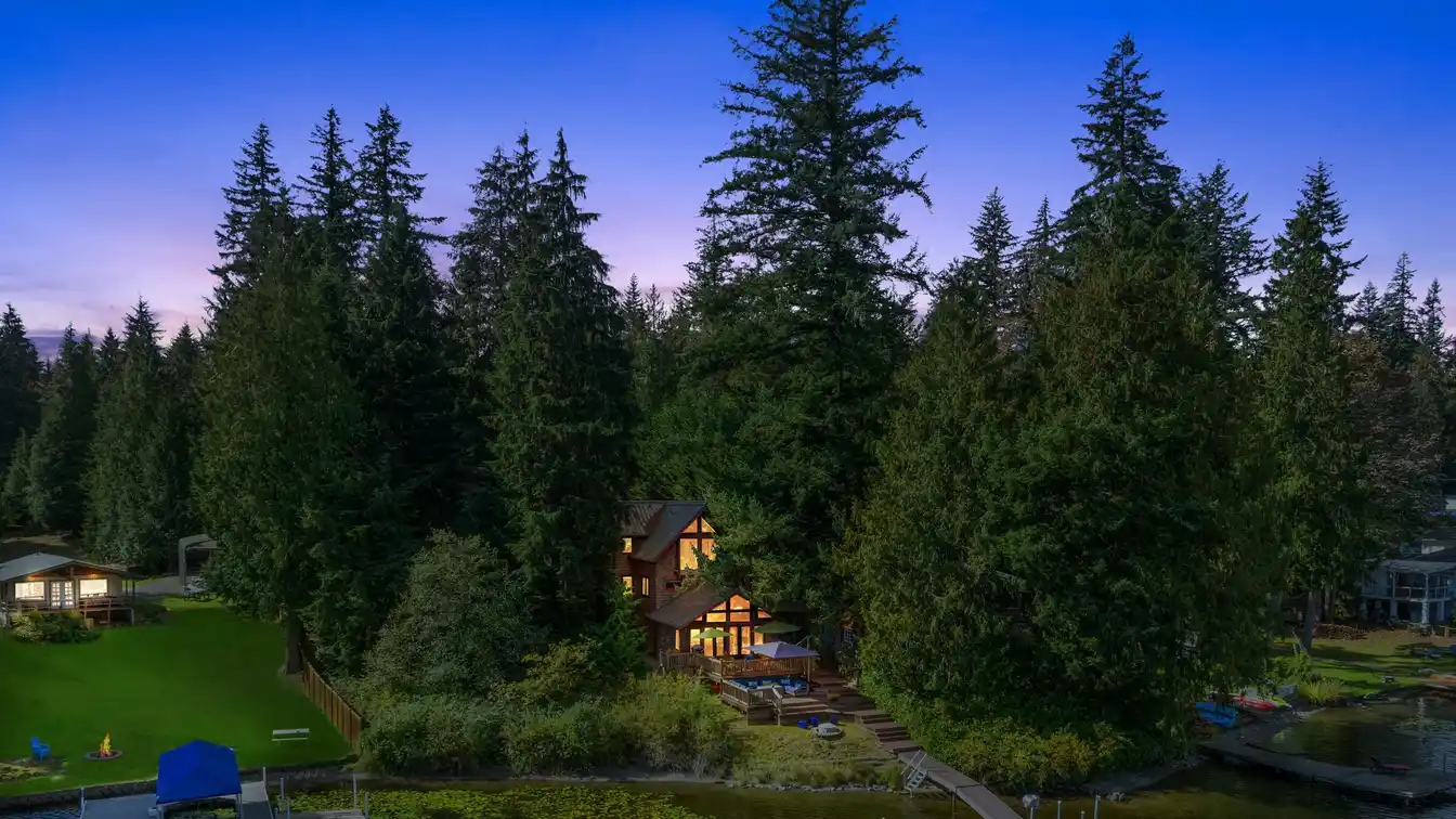Incredible Custom Craftsman Property on Flowing Lake