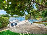 THE ULTIMATE IN CANAL-FRONT LIVING