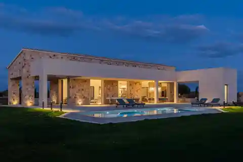 Modern Semi-Detached Finca with Natural Stone Walls and Pool