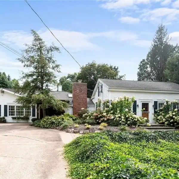 BEAUTIFULLY UPDATED CENTURY HOME WITH NEWER ADDITION