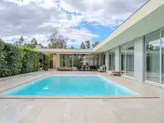 Contemporary Riverside Villa with Heated Pool