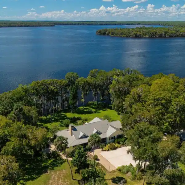 GORGEOUS RIVERFRONT CUSTOM HOME ON 22 ACRES