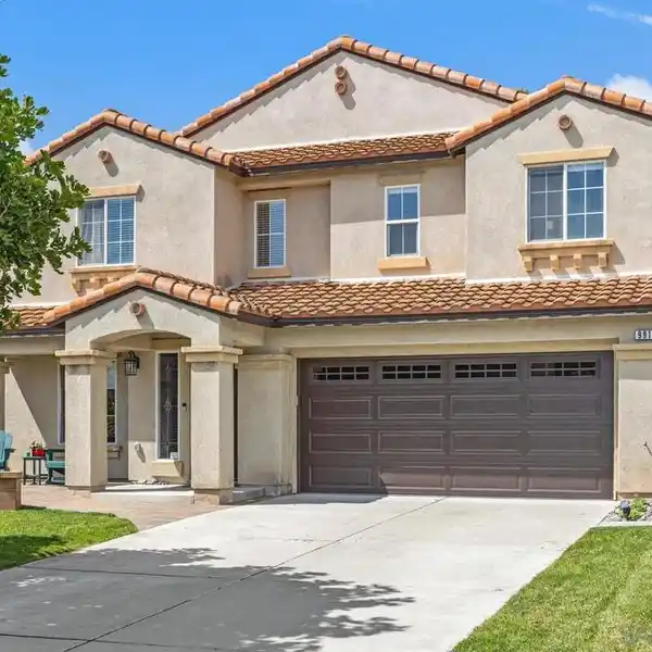 UPGRADED HOME WITH LARGE BACKYARD