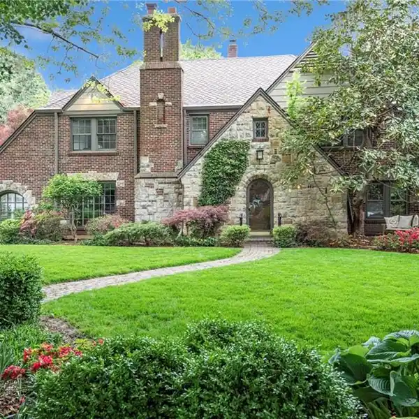 STUNNING ALL BRICK AND STONE TUDOR