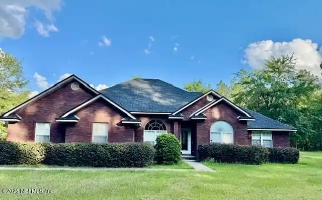 Meticulously Maintained Single-story Brick Home on 20 Acres