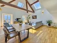 BRIGHT CONTEMPORARY HOME IN EXCLUSIVE SETTING