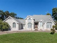 BEAUTIFUL, PRIVATE, LUXURY RETREAT TUCKED INTO THE HILLS OF CENTER TOWNSHIP