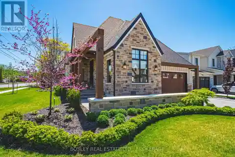 Custom-Designed Bungalow with Elegant Landscaping and Architectural Detail