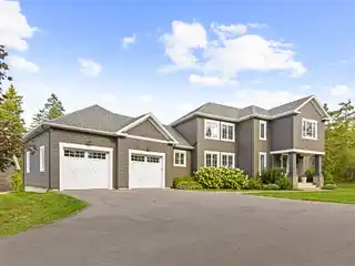 Immaculate Custom-Built Home on a 1.78 Acre Private Wooded Lot