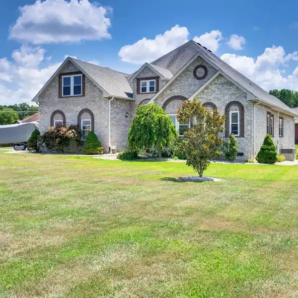 METICULOUSLY MAINTAINED ALL-BRICK CORNER LOT HOME