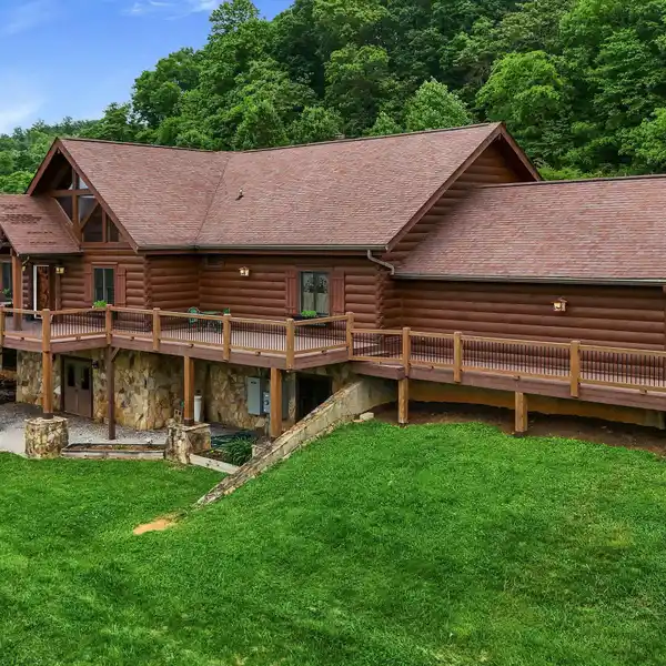MASSIVE LOG CABIN HOME ON EXPANSIVE ACREAGE