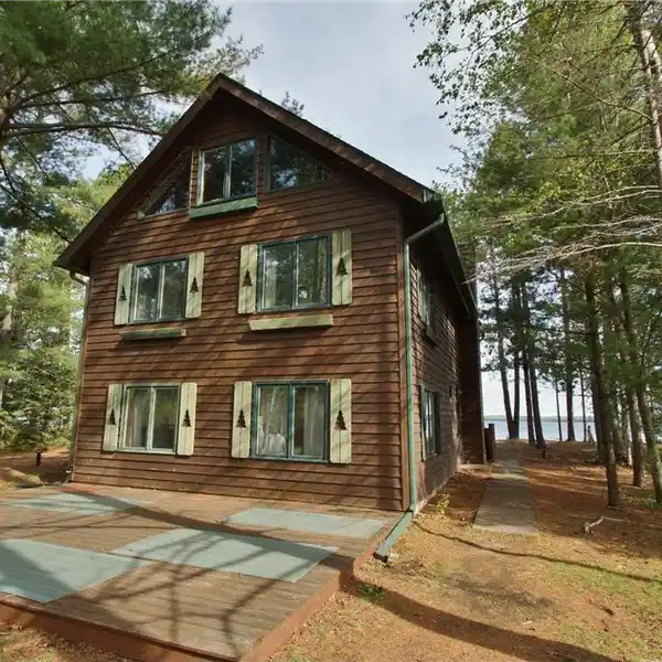 LAKEFRONT GEM WITH SANDY SHORELINE
