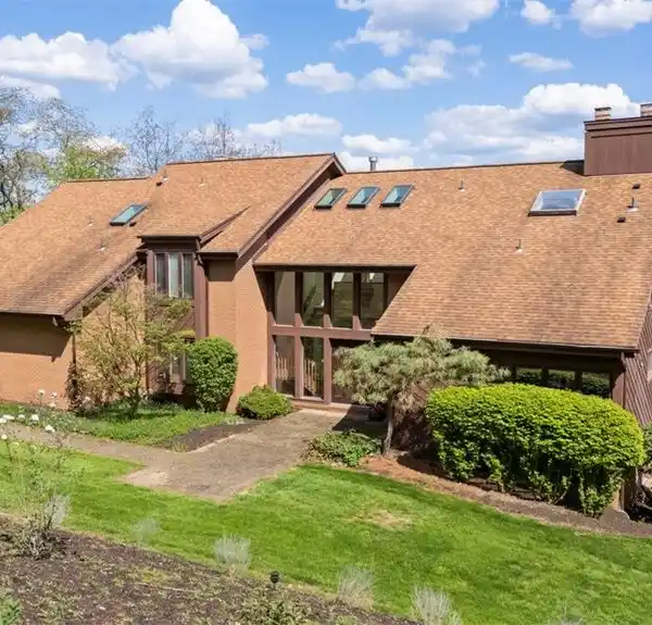 STRIKING HOME ON THREE SERENE ACRES