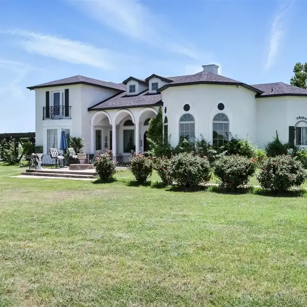 STUNNING MEDITERRANEAN-STYLE STUCCO HOME