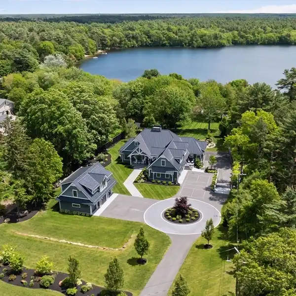 CUSTOM WATERFRONT ESTATE ON PICTURESQUE SAMPSON POND