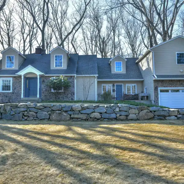 EXCEPTIONAL CENTER HALL COLONIAL IN THE HEART OF RAMSEY