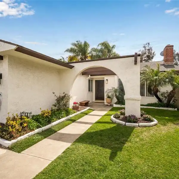 COMPLETELY REMODELED COASTAL SPANISH STYLE HOME
