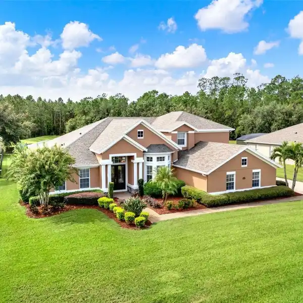 RARE LUXURY RETREAT IN GATED COUNTRY LAKE ESTATES