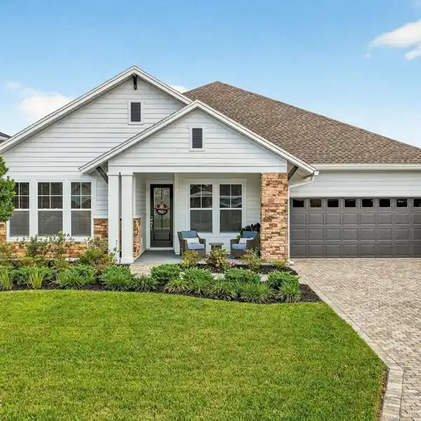 LUXURY LIVING IN THIS EXQUISITE WATERFRONT POOL HOME