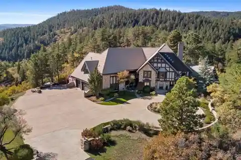 Fully Renovated Tudor Estate Atop 40 Acres