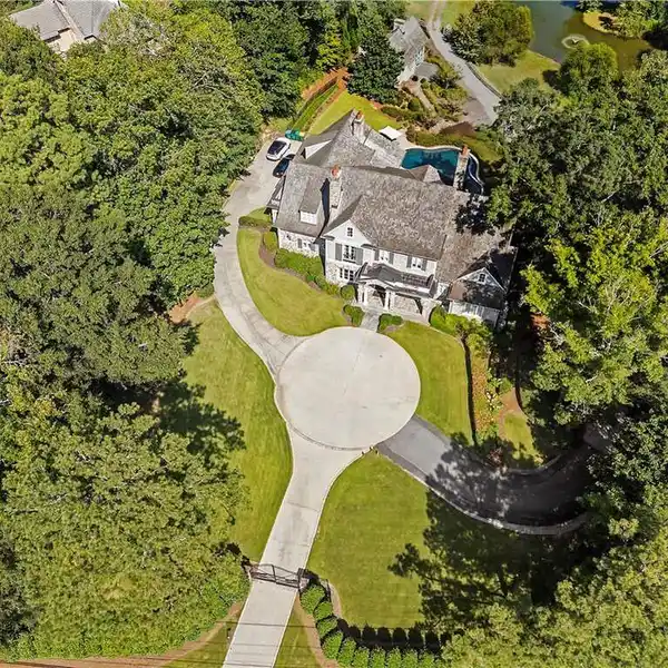 PICTURESQUE GATED ESTATE WITH RESORT-STYLE POOL AND SPA