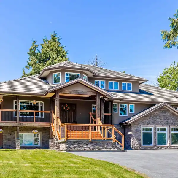 SPACIOUS AND VERSATILE HOME ON TRANQUIL ACREAGE