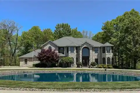 Exceptional Residence on over Five Wooded Acres