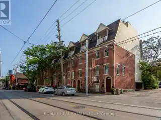 Victorian-Inspired Red Brick Townhouse with Rooftop Terrace