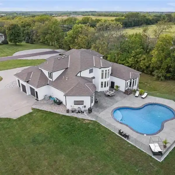 LUXURY ESTATE ON FOUR ACRES IN THE WILDFLOWER SUBDIVISION
