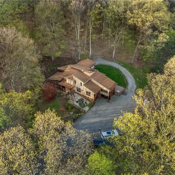 CONTEMPORARY HOME ON 34 WOODED ACRES