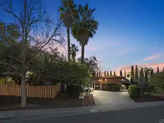 Unmatched Multi-generational Living on over .64 Acres with Two Homes