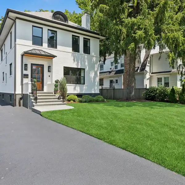 CLASSIC BRICK HOME IN COVETED HUBBARD WOODS