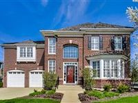 EXPANSIVE UPDATED BRICK HOME