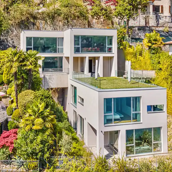 CONTEMPORARY HOME WITH LOVELY LAKE LUGANO VIEWS