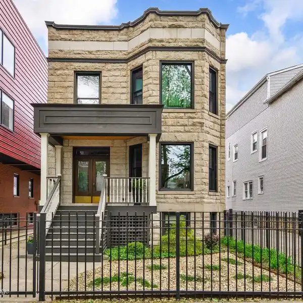 THOUGHTFULLY RENOVATED GREYSTONE ON PICTURESQUE ANDERSONVILLE STREET