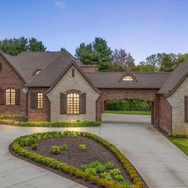 STUNNING CUSTOM RANCH WITH SIX-CAR GARAGE