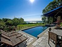 IMMACULATE HOME WITH TANTALIZING VIEWS OF SAG HARBOR COVE
