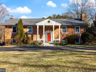 Spacious Brick Colonial Near Golf Course Access