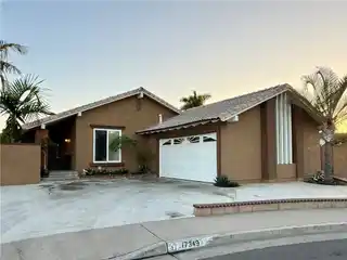 Solar-Powered Home with Private Backyard Oasis