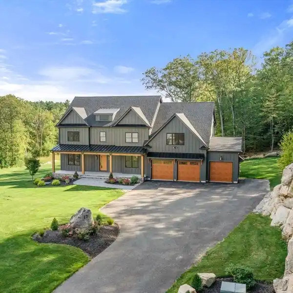 CUSTOM CRAFTED MODERN FARMHOUSE IN WHISPER WAY