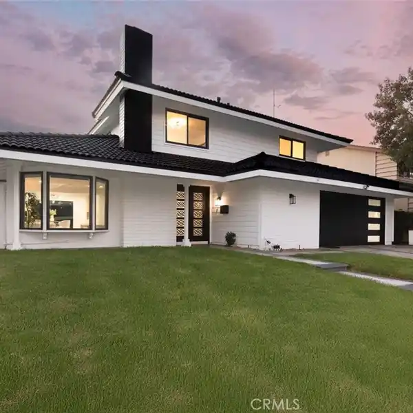 TURNKEY COASTAL ELEGANCE WITH DESIGNER RENOVATION