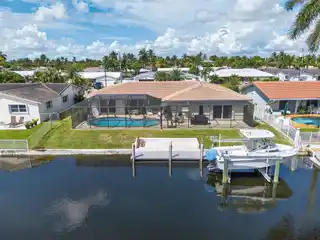 Well-Maintained Waterfront Pool Home