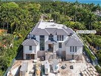 NEW HOME IN GATED BEACHFRONT ENCLAVE
