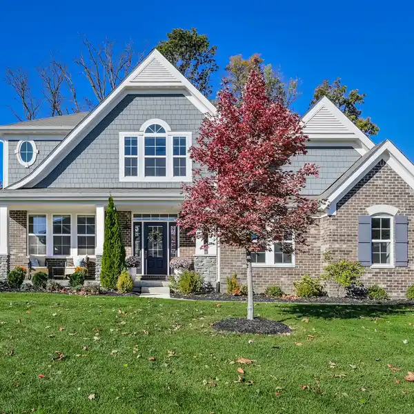 ELEGANT WASHINGTON TOWNSHIP HOME WITH COVERED PATIO & FIREPLACE