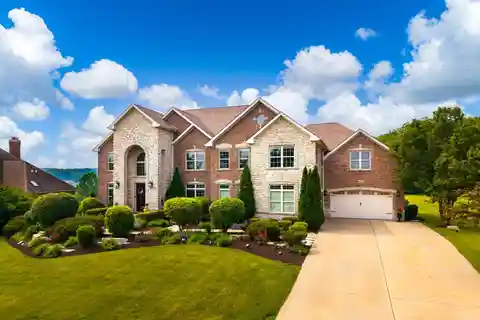 Elegant Residence in the Prestigious Whitetail Ridge Golf Course Community