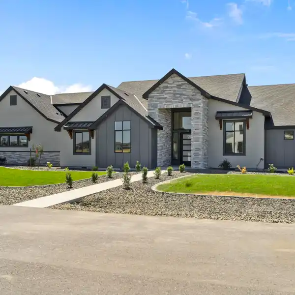 EXQUISITE NEW CUSTOM HOME WITH PANORAMIC VIEWS