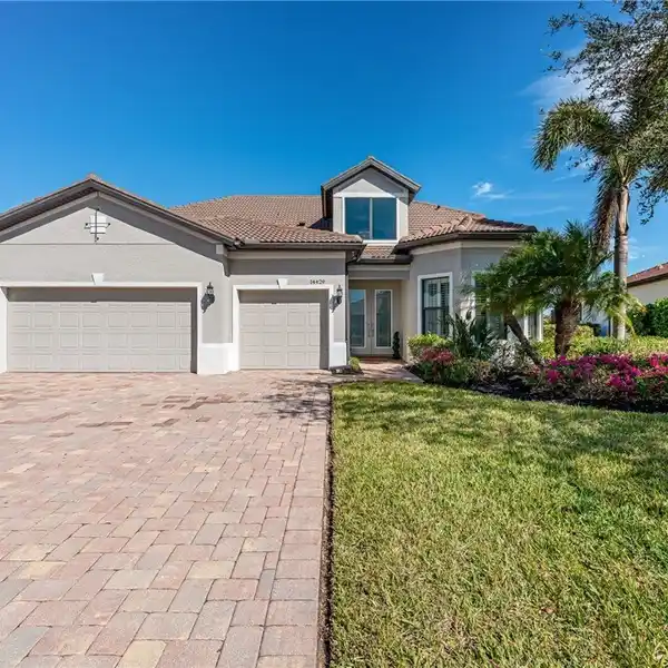 RARELY AVAILABLE HOME IN DESIRABLE CORKSCREW SHORES
