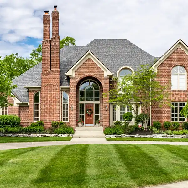 CUSTOM ESTATE WITH SERENE WATERFRONT SETTING