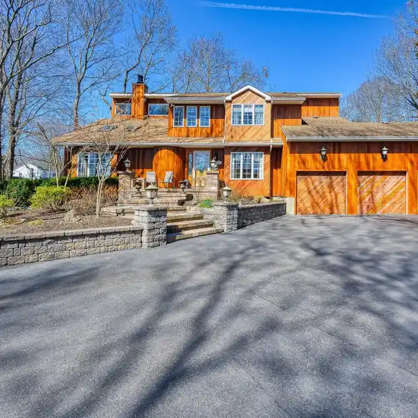 AMAZING HOME JUST SHY OF AN ACRE